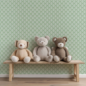 Mint Harmony wallpaper with abstract white leaf silhouettes, perfect for modern and Scandinavian playrooms, featuring toy bears on a bench.