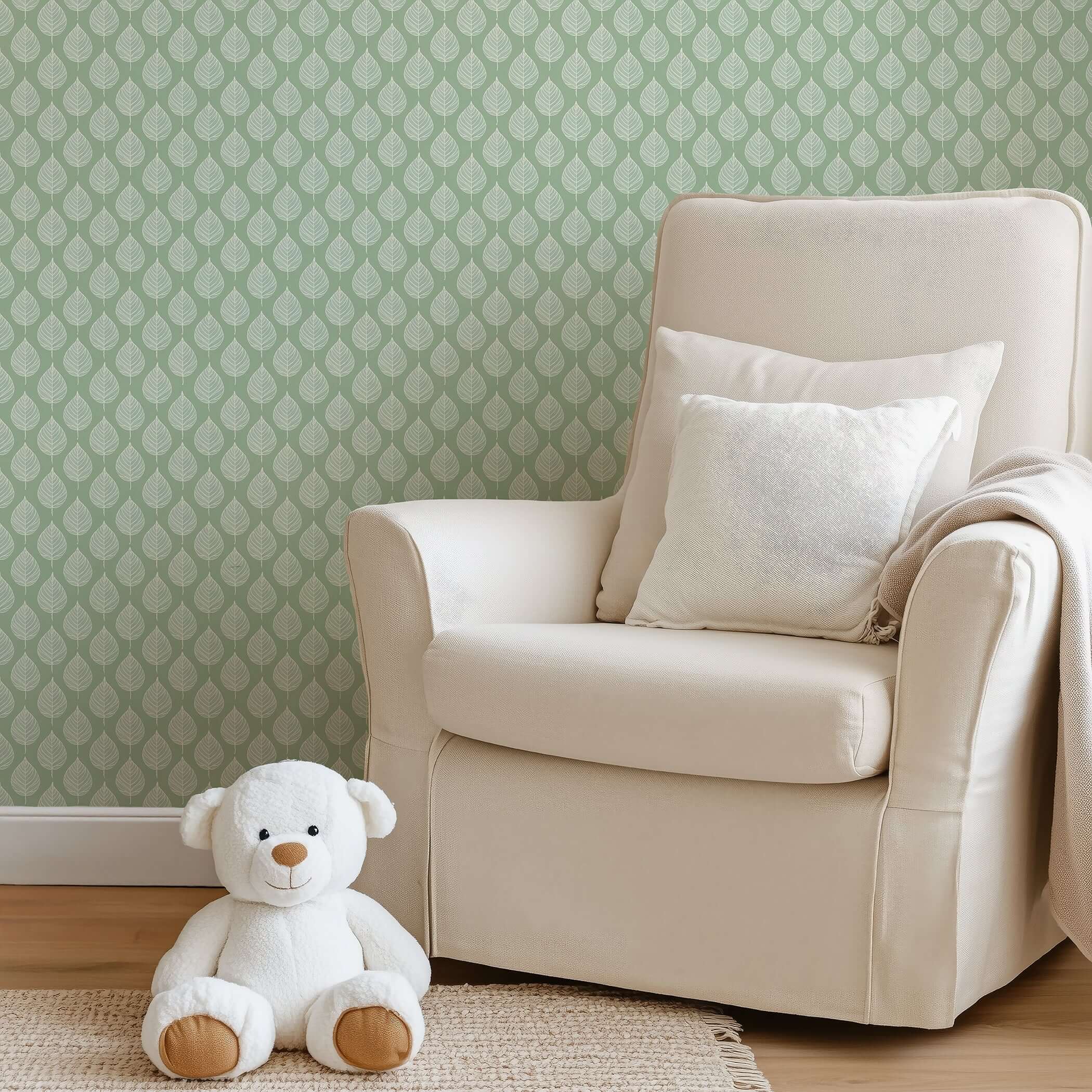 Cozy nursery with Mint Harmony wallpaper featuring white leaf patterns on mint green, modern abstract design for children’s playroom.