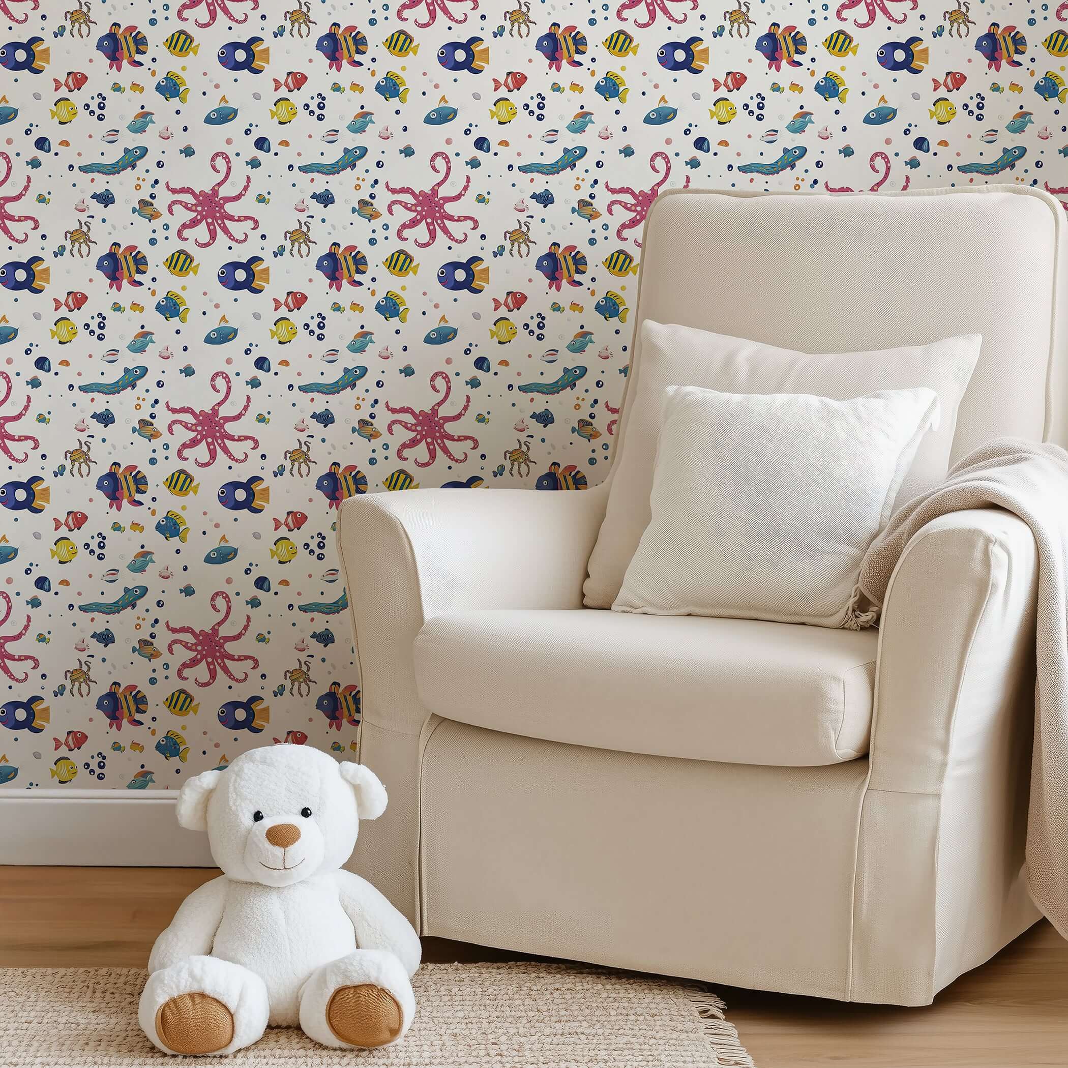 Coastal children's playroom with Underwater Friends wallpaper featuring fish, octopus, and sea animals creating an ocean-themed wonderland.