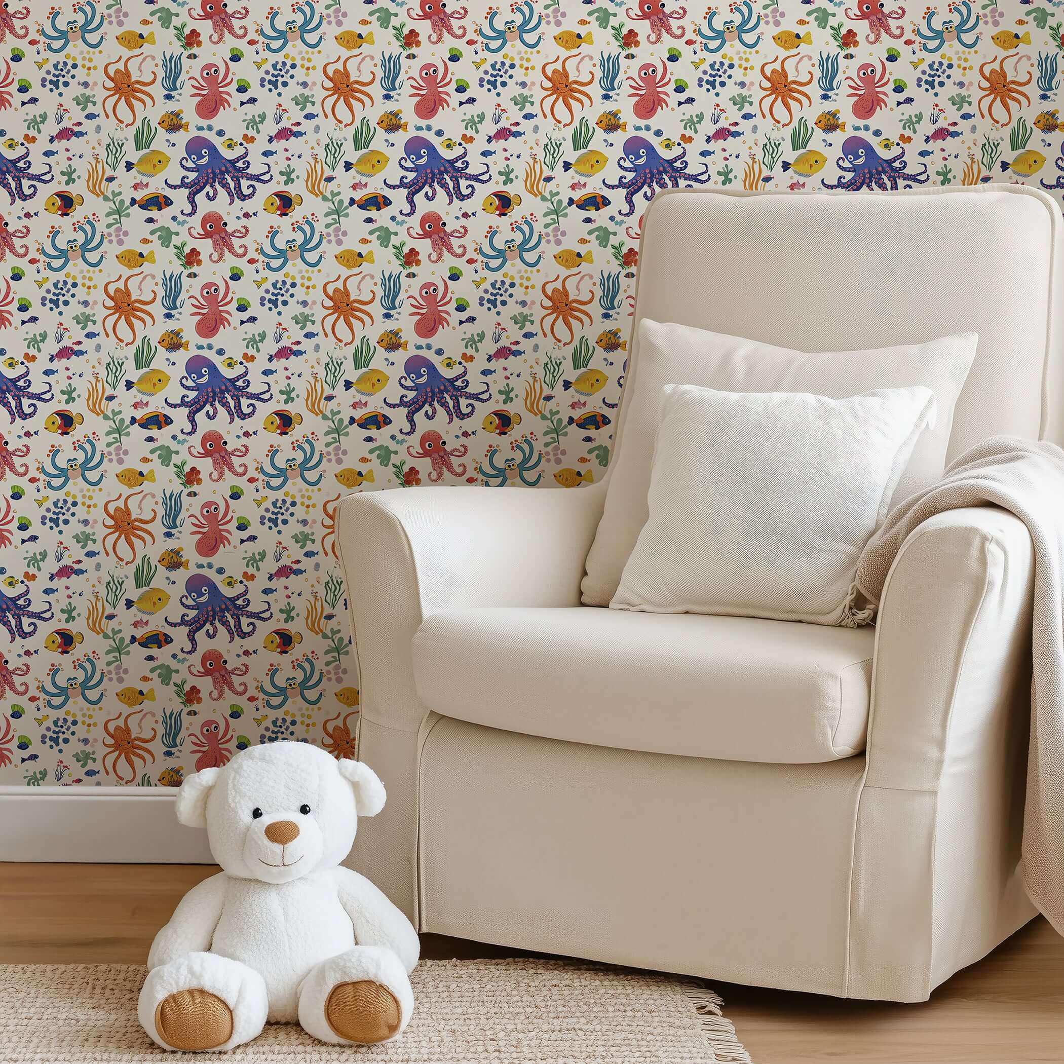 Coastal-themed children's room with "Reef Buddies" ocean wallpaper featuring fish and coral, perfect for nursery playrooms.