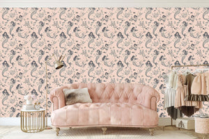 Mermaid Dreams Wallpaper in pink background for nursery or playroom, featuring whimsical mermaids and ocean design for a coastal vibe.