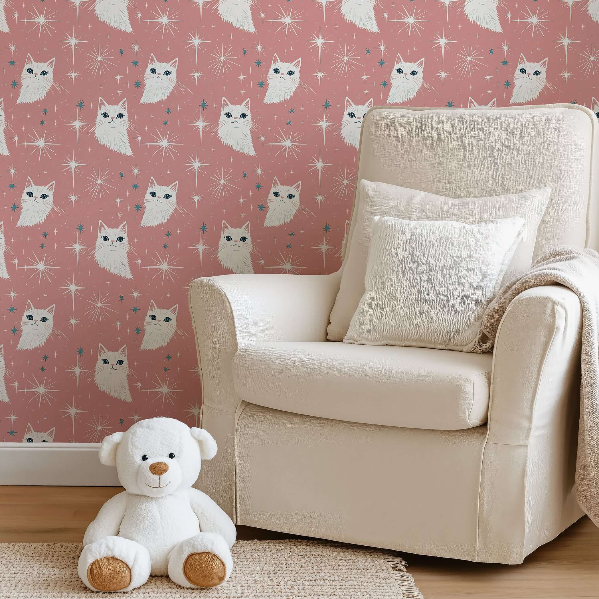 Milky Way Meow wallpaper featuring fluffy white cats on dusty pink, perfect for nurseries or playrooms with a mid-century touch.