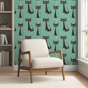 Mid-century modern wallpaper showcasing sleek black cats on distressed teal, ideal for children's playroom or nursery decor.