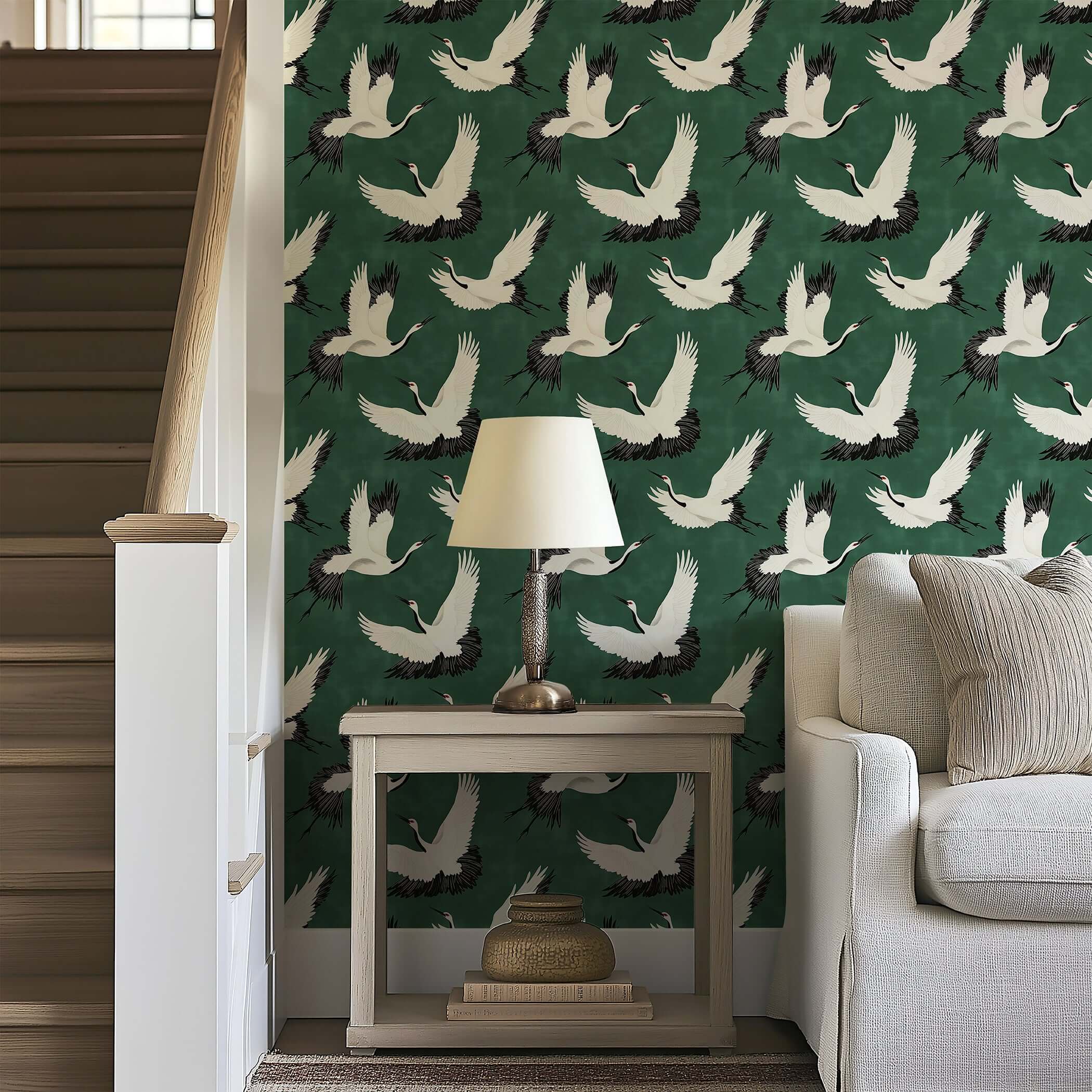 "Flight of the Cranes" wallpaper showcasing white cranes on a green background; perfect for classic or contemporary decor.