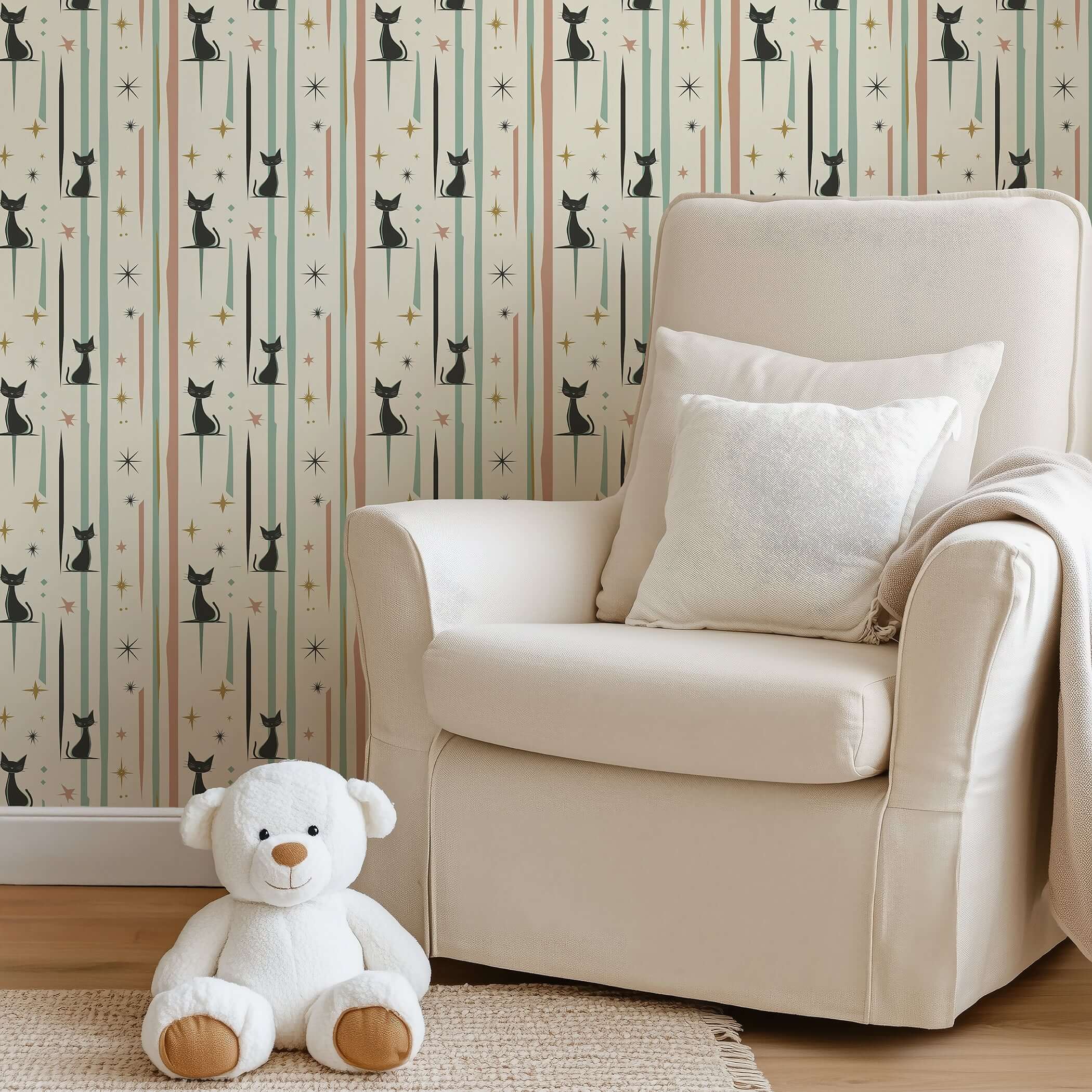 Cozy playroom with mid-century modern Cosmic Cats wallpaper featuring sleek black cats and starbursts, perfect for nurseries.