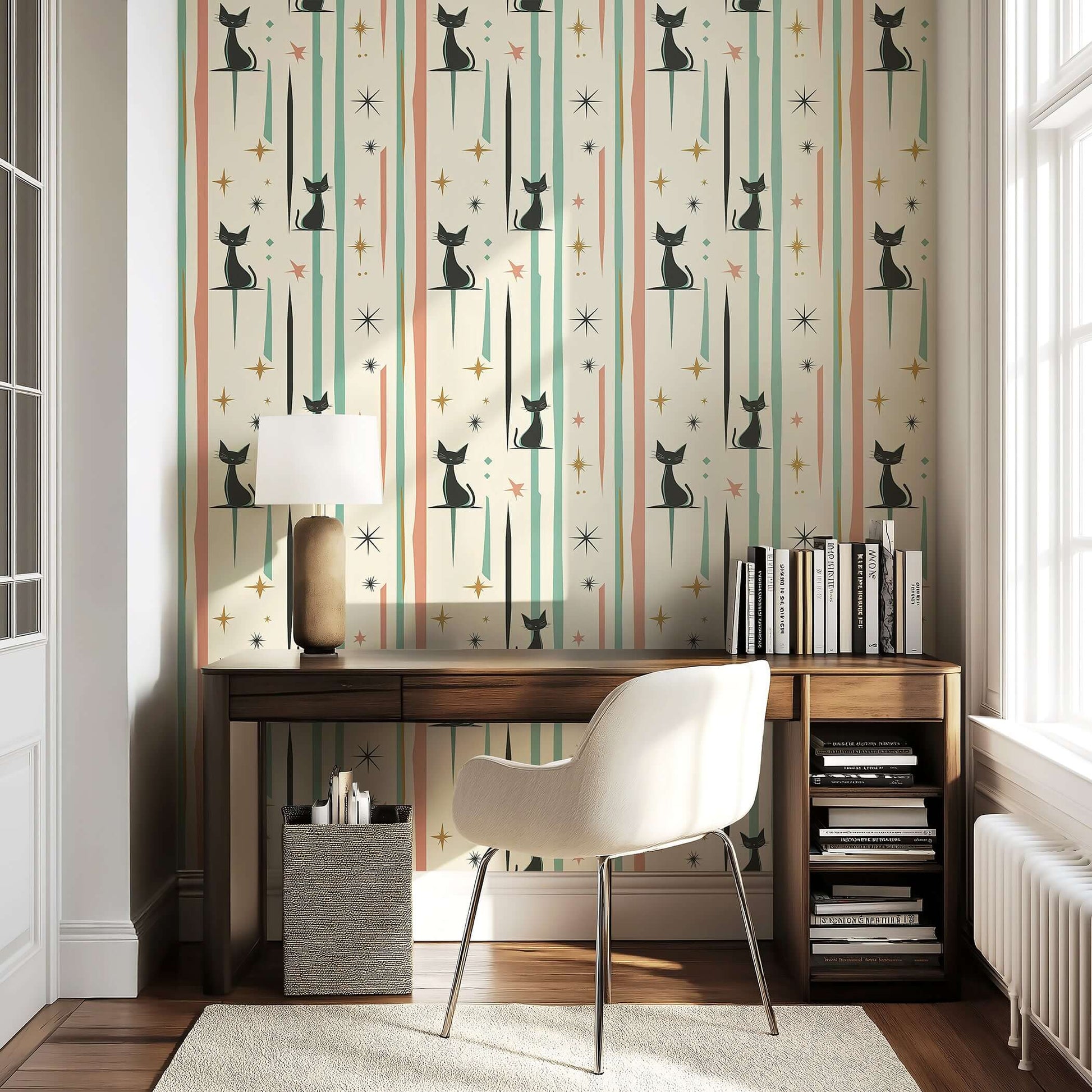 Mid-century modern Cosmic Cats wallpaper with black cats, pastel retro starbursts in a cozy study. Ideal for nurseries or playrooms.
