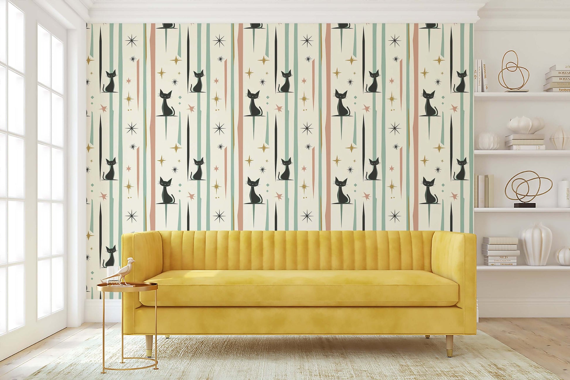 Retro cats and starbursts wallpaper with yellow sofa, perfect for mid-century modern nursery or playroom.