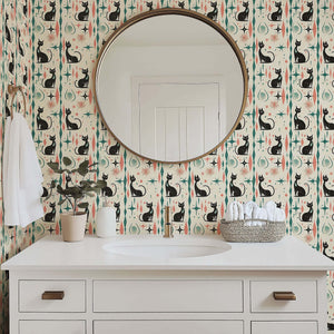 Retro-futuristic wallpaper featuring black cats and atomic shapes in soft coral and teal, perfect for mid-century modern children’s rooms.