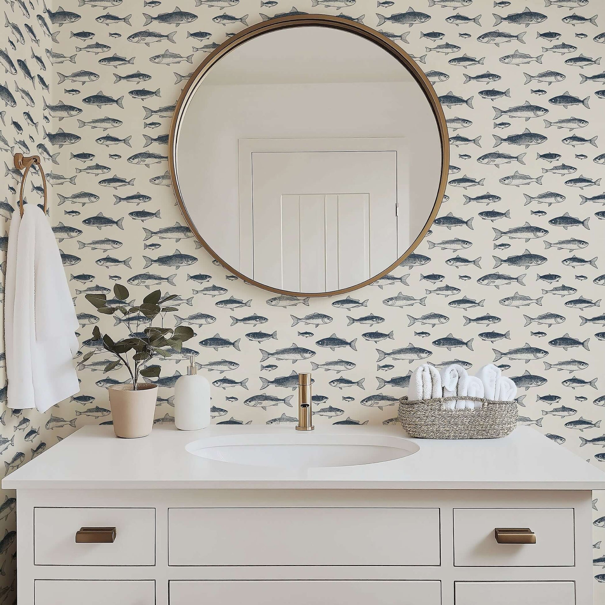 Elegant coastal bathroom featuring Vintage Fisherman wallpaper with hand-drawn fish illustrations, enhancing nautical charm.