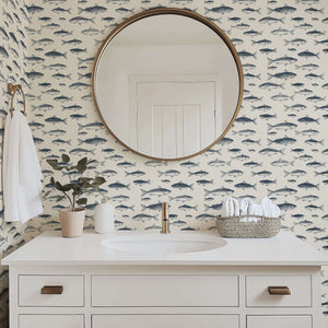 Elegant coastal bathroom featuring Vintage Fisherman wallpaper with hand-drawn fish illustrations, enhancing nautical charm.