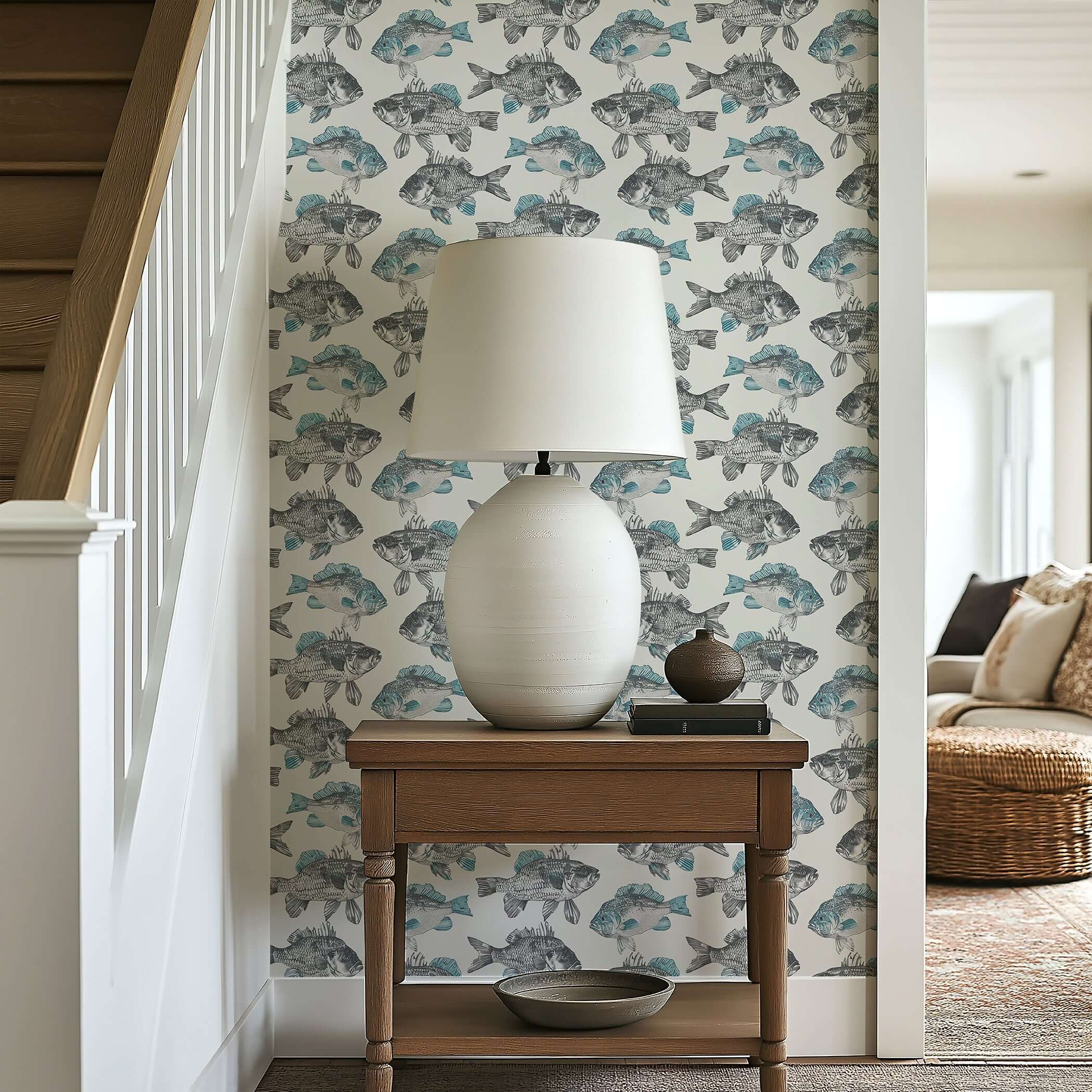 Coastal Currents wallpaper in a hallway, featuring hand-drawn fish with watercolor details, enhancing a beach home with ocean vibes.