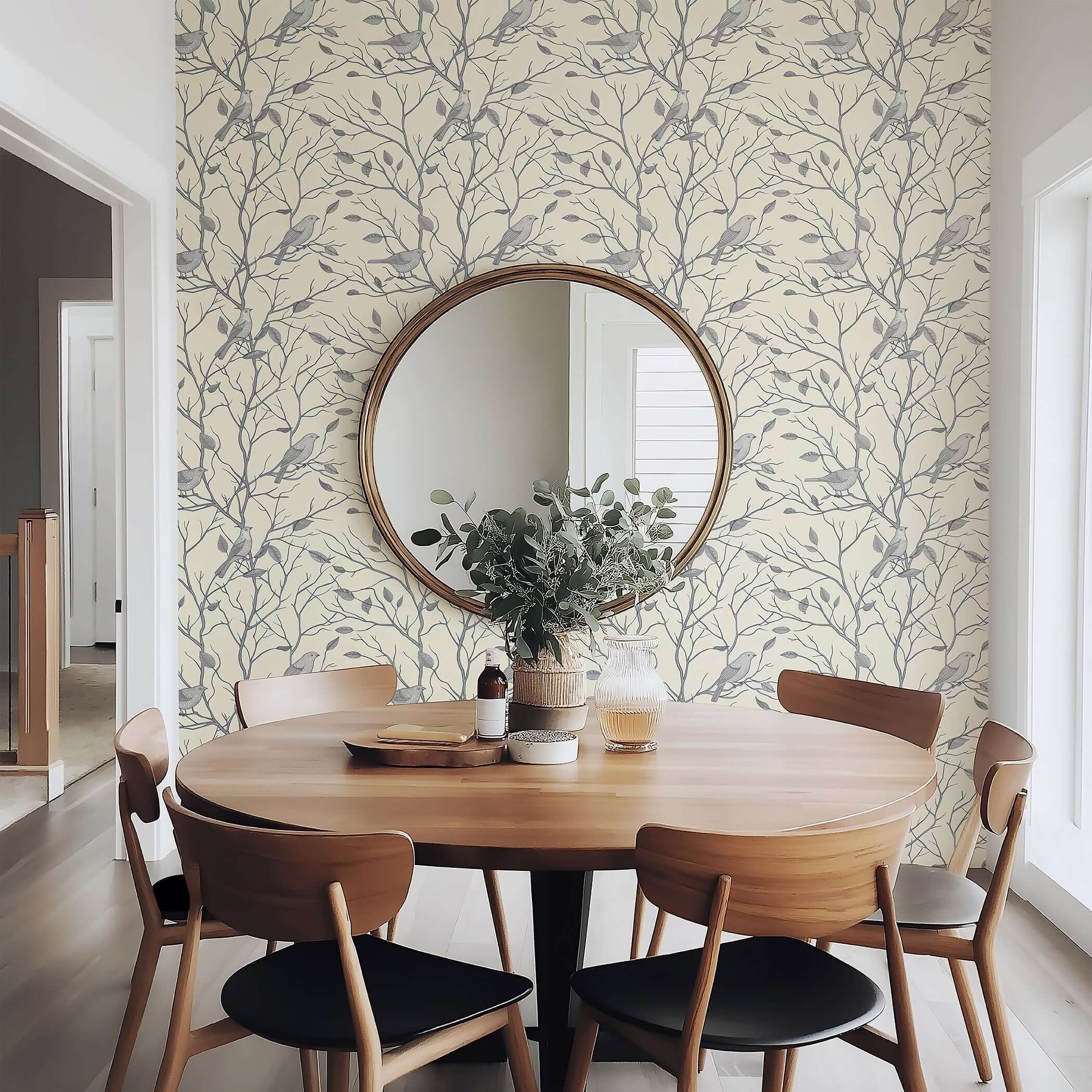 Monochromatic wallpaper with serene songbird silhouettes and branches, enhancing a peaceful dining area with natural elegance.