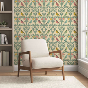 Edwardian Aviary Bliss wallpaper features songbirds and floral damask in a modern design creating a vintage ambiance in a living room.