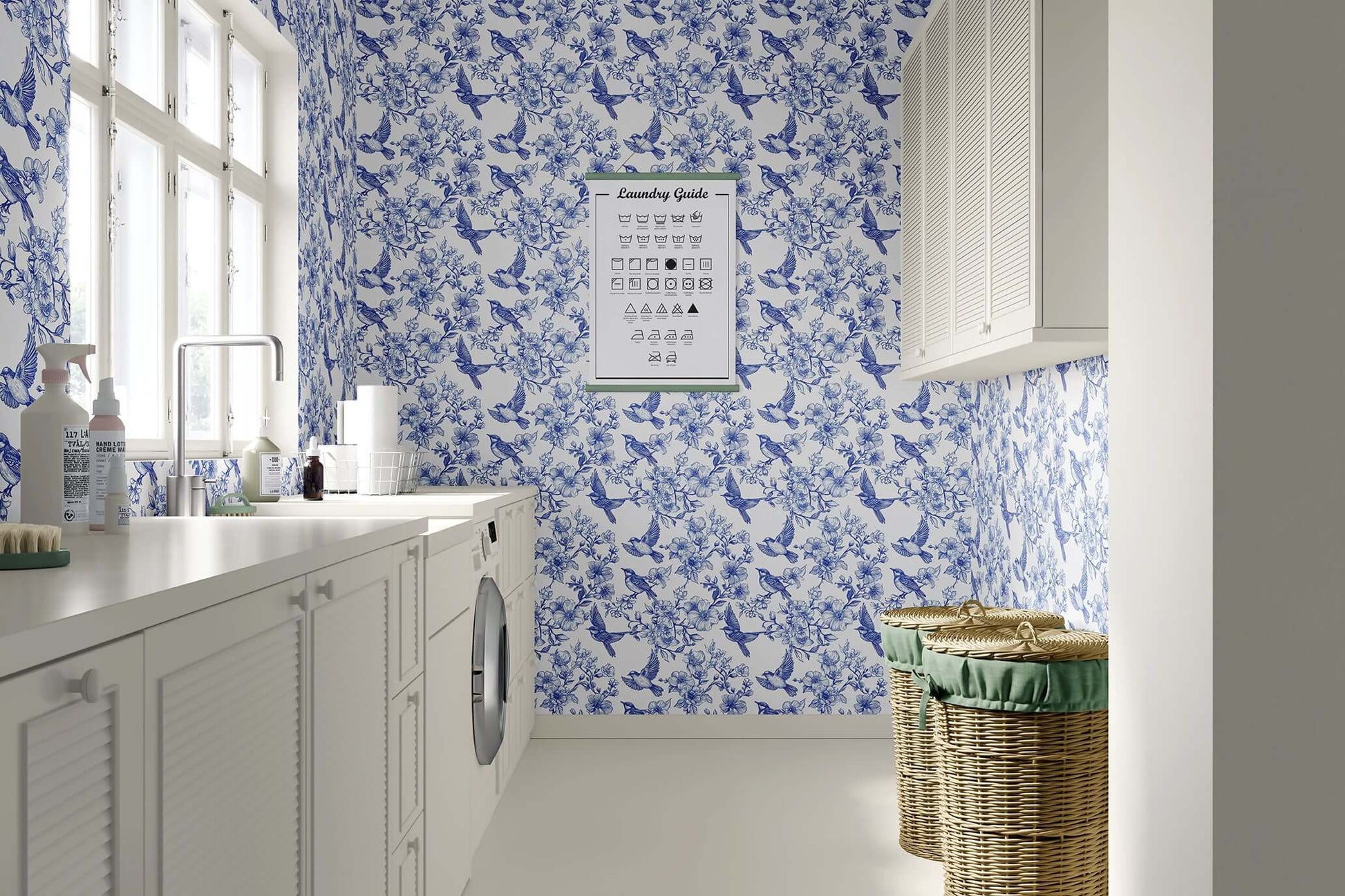 Laundry room with blue-and-white Songbird Garden Toile wallpaper featuring songbirds and blossoms, offering a classic French toile look.