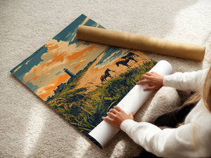 Person unrolling 'Wild Horses of the Outer Banks' art print featuring horses and a lighthouse on a beach.