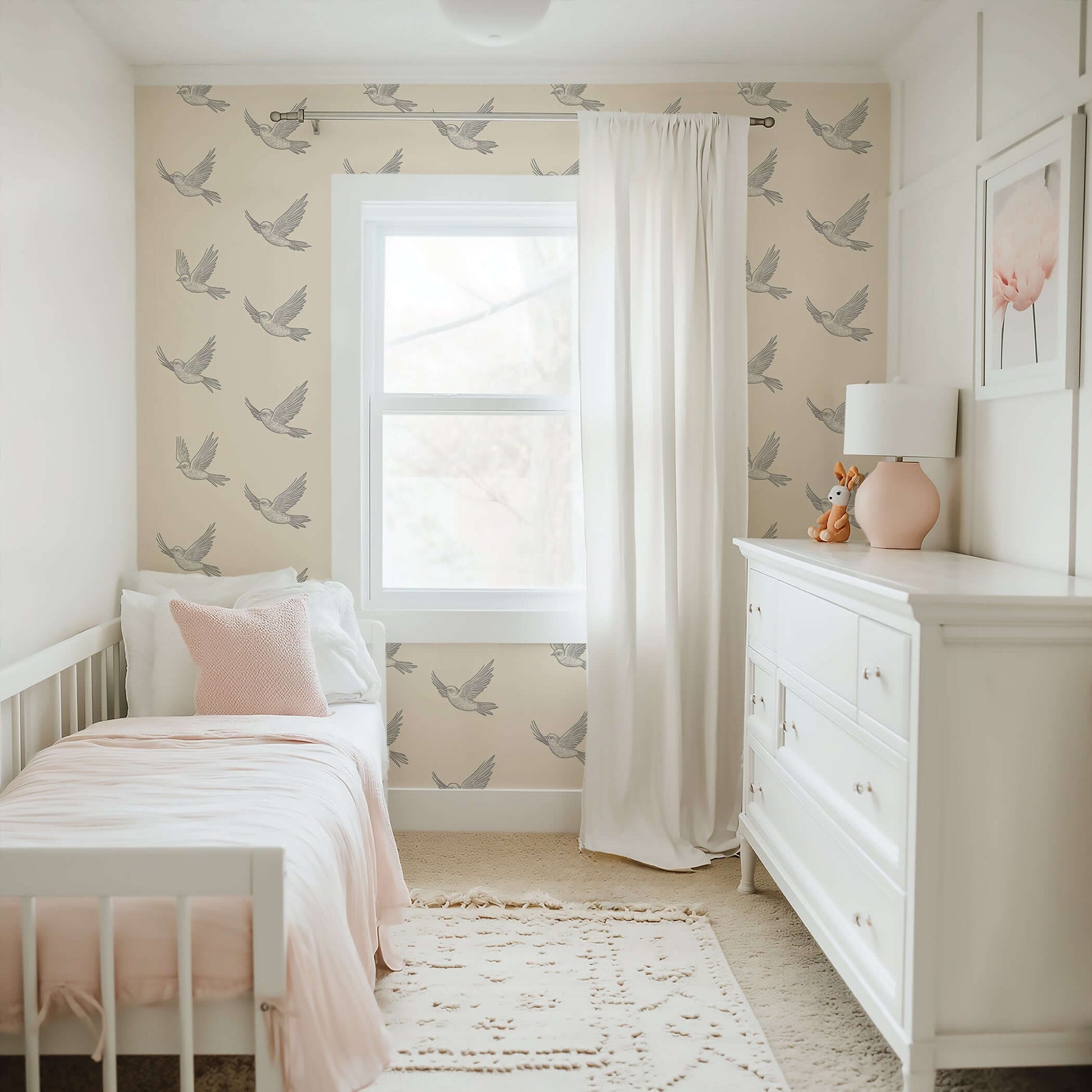 Monochrome birds wallpaper in serene nursery, showcasing modern design with graceful flight pattern on neutral backdrop.