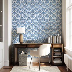 Elegant room with Coastal Luxe Coral wallpaper featuring blue coral reef damask pattern, wooden desk, and chair for a serene ocean-inspired decor.