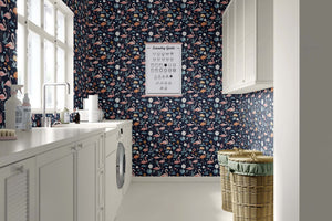 Navy coastal wallpaper featuring flamingos in a moonlit lagoon, ideal for children's playroom, by Wall Artifacts.