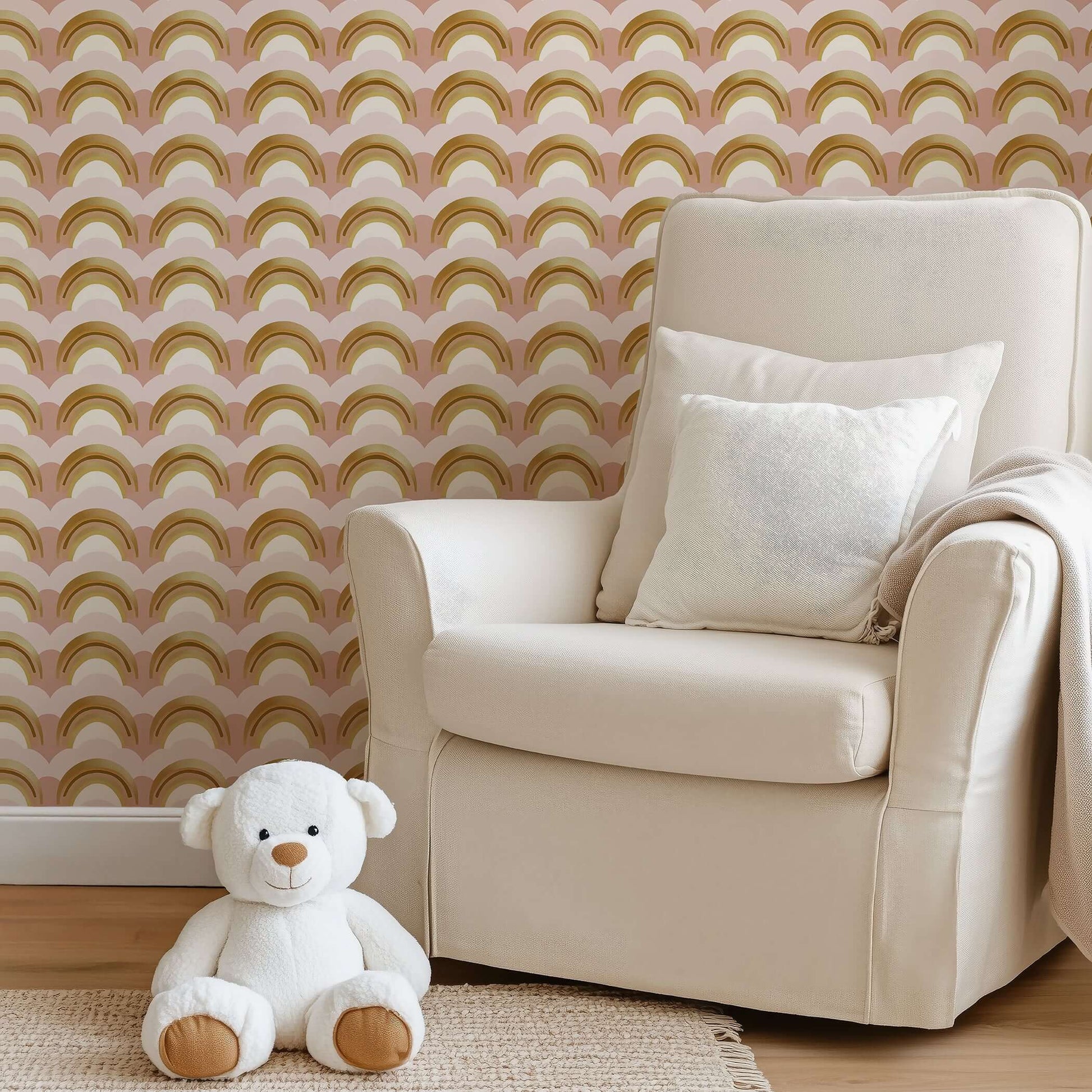 Soft nursery with Teddy bear and golden rainbow wallpaper, perfect for children's playroom.