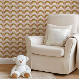 Soft nursery with Teddy bear and golden rainbow wallpaper, perfect for children's playroom.