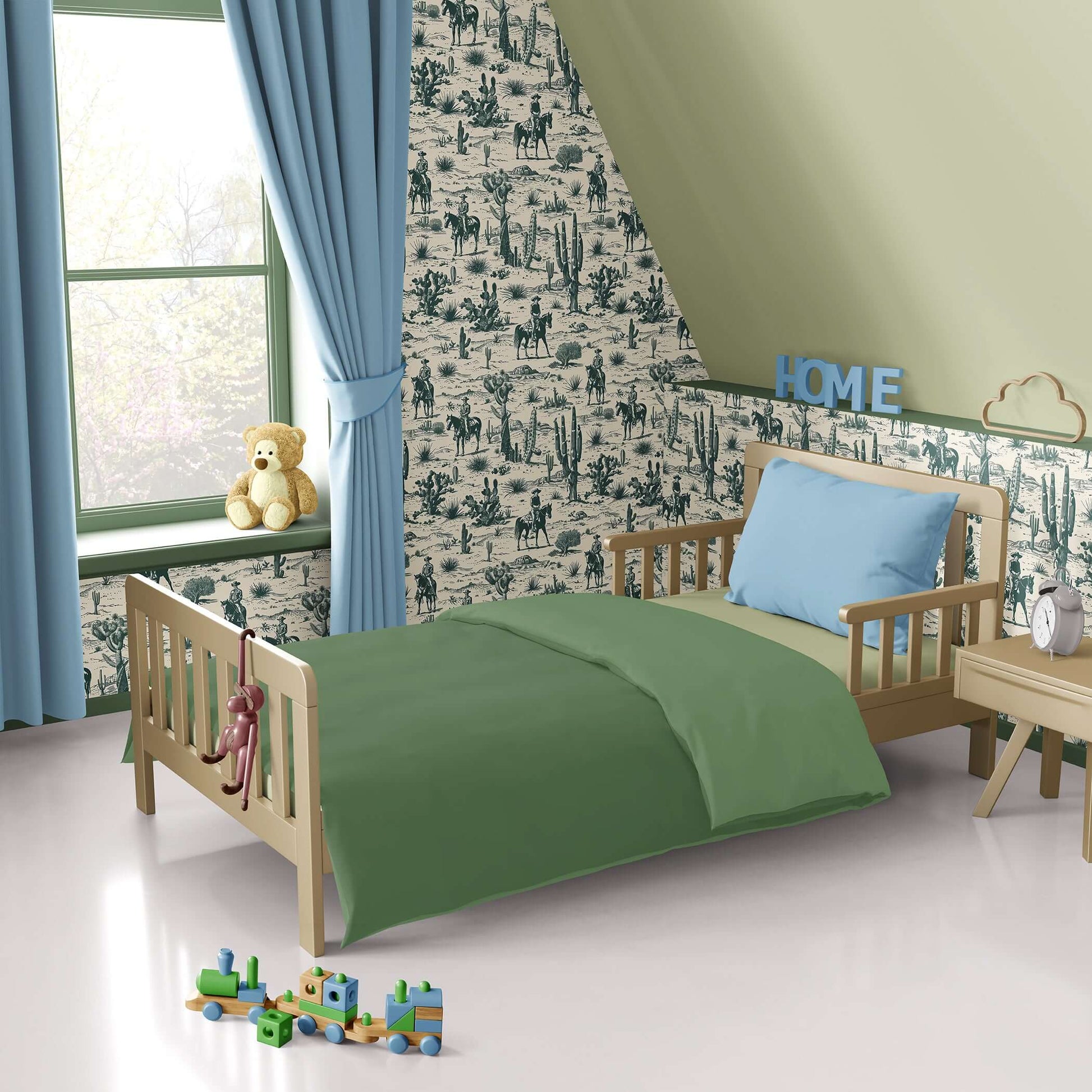 Western-themed nursery with Cowboy Trails toile wallpaper featuring cowboys, horses, desert cacti, and rustic decor.