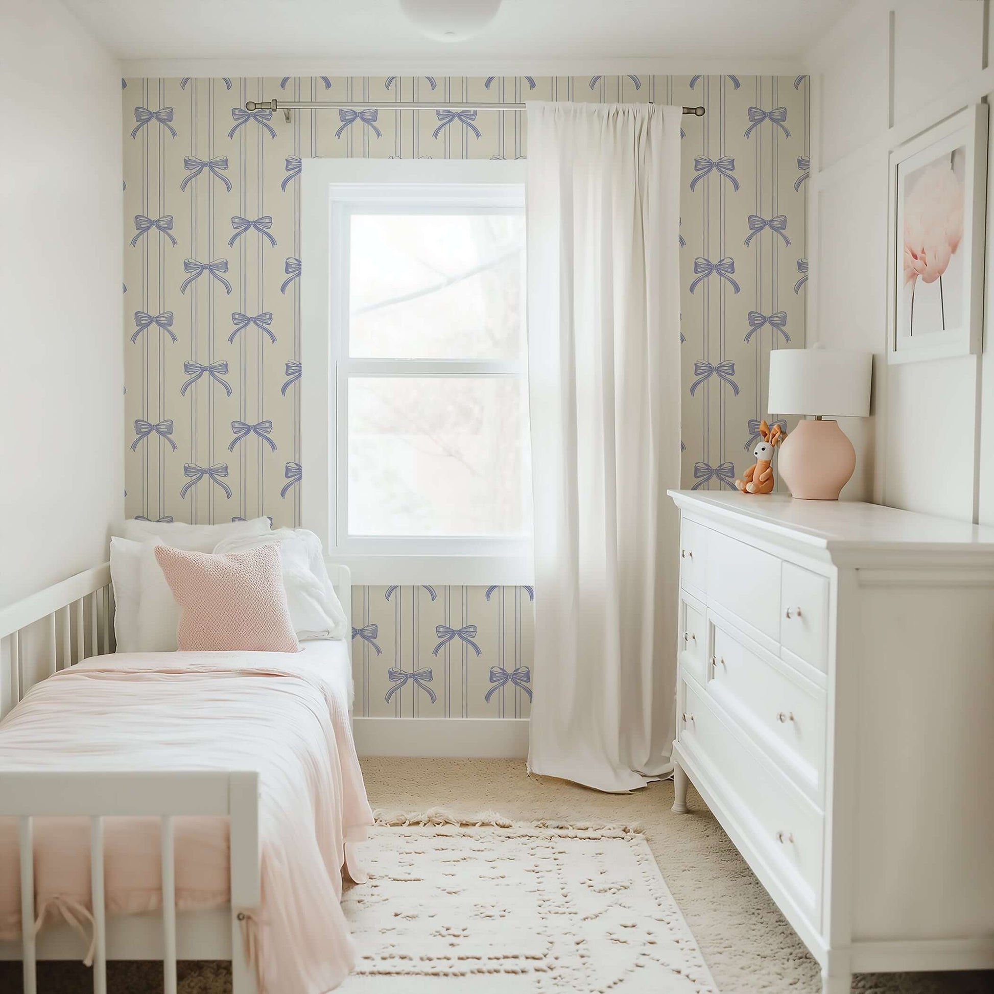 Nursery room with Bow-Tied Beauty wallpaper featuring lavender ribbons and bows, creating an elegant and vintage ambiance.