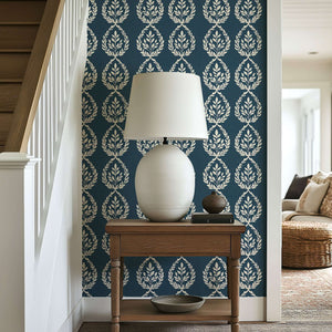 Navy Heritage Wreath Wallpaper featuring elegant ivory laurel wreaths on navy, ideal for traditional and coastal interiors.