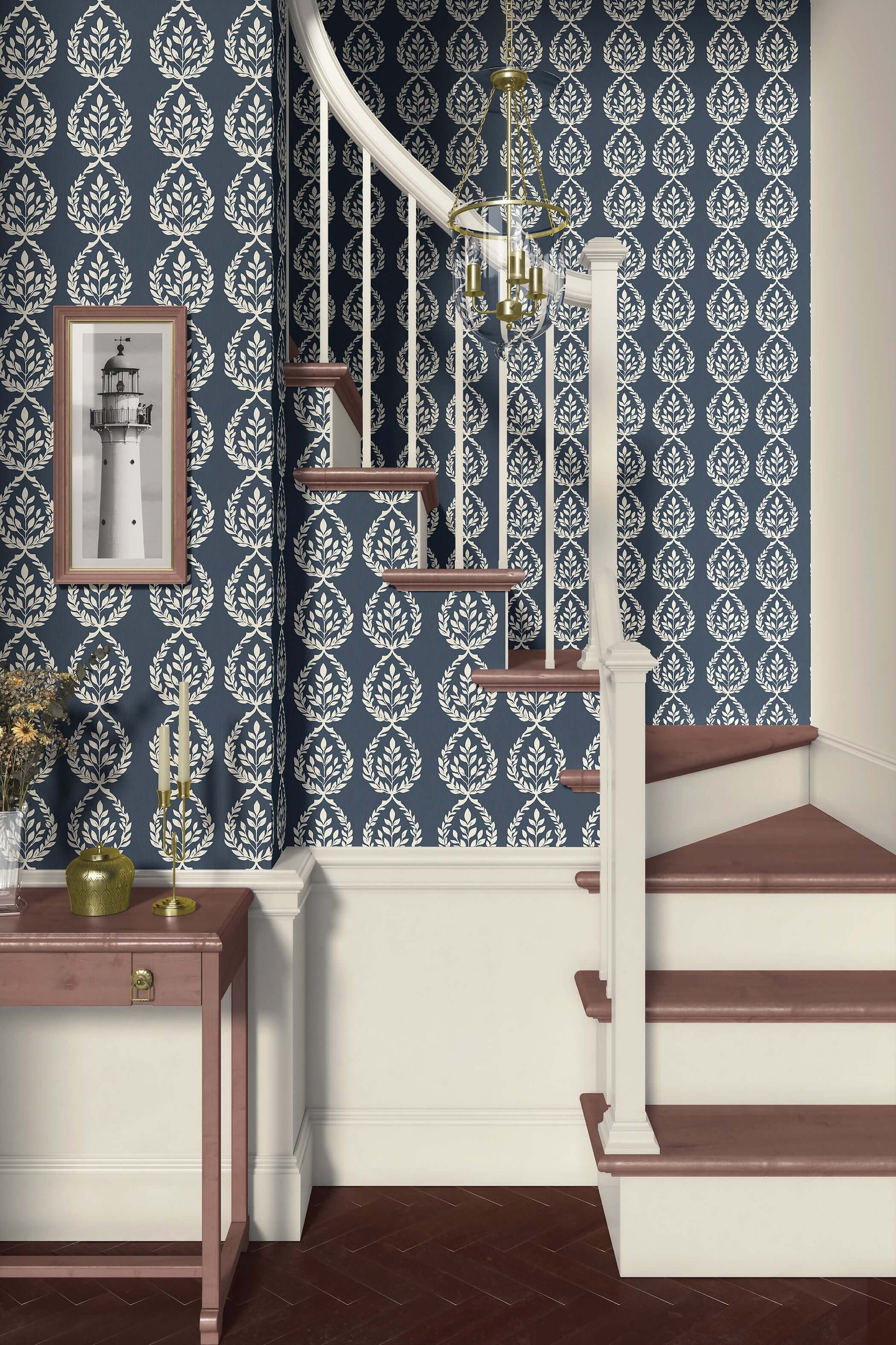 Navy Heritage Wreath Wallpaper with ivory laurel designs, perfect for traditional or coastal interiors, shown on a staircase wall.