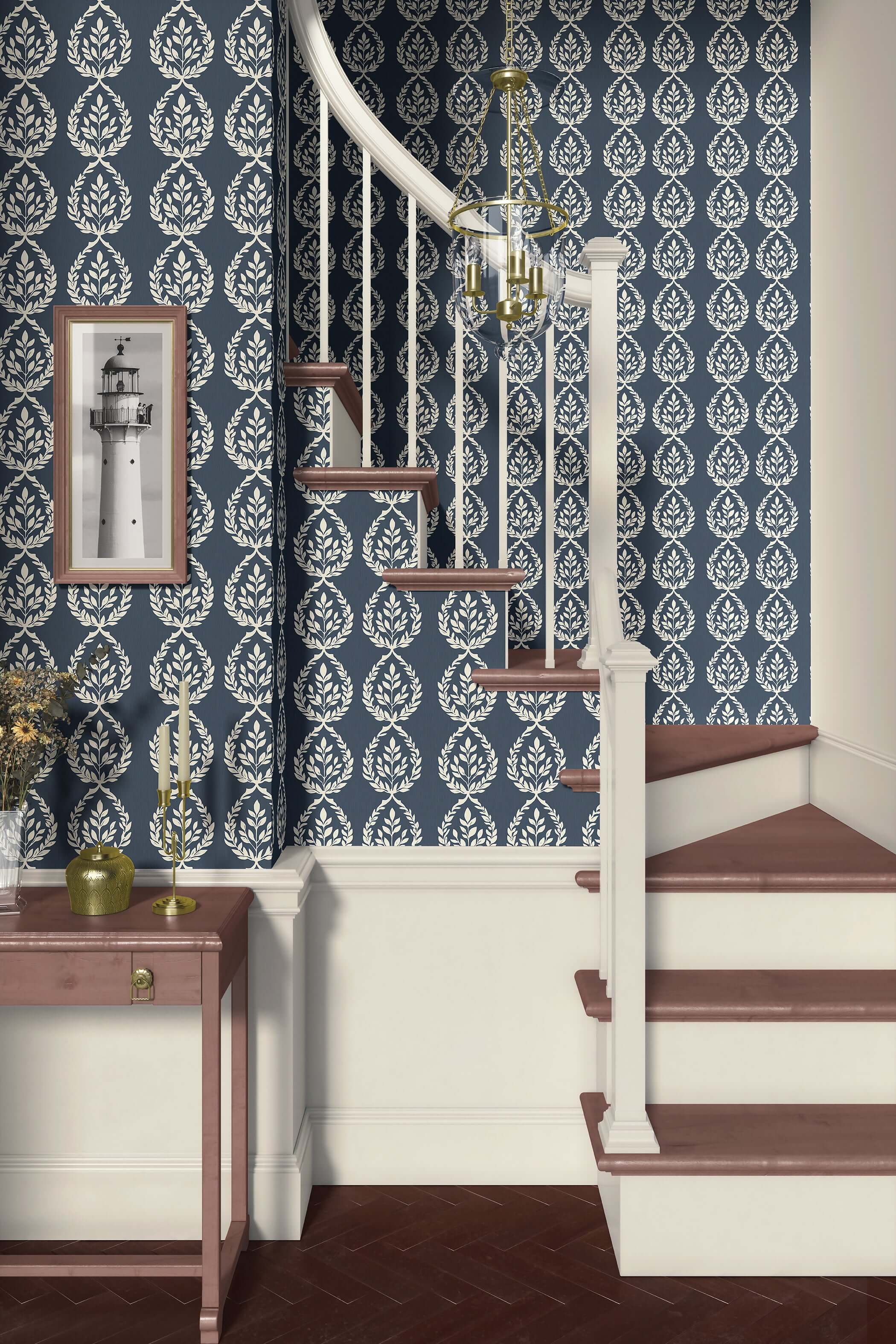 Navy Heritage Wreath Wallpaper with ivory laurel designs, perfect for traditional or coastal interiors, shown on a staircase wall.