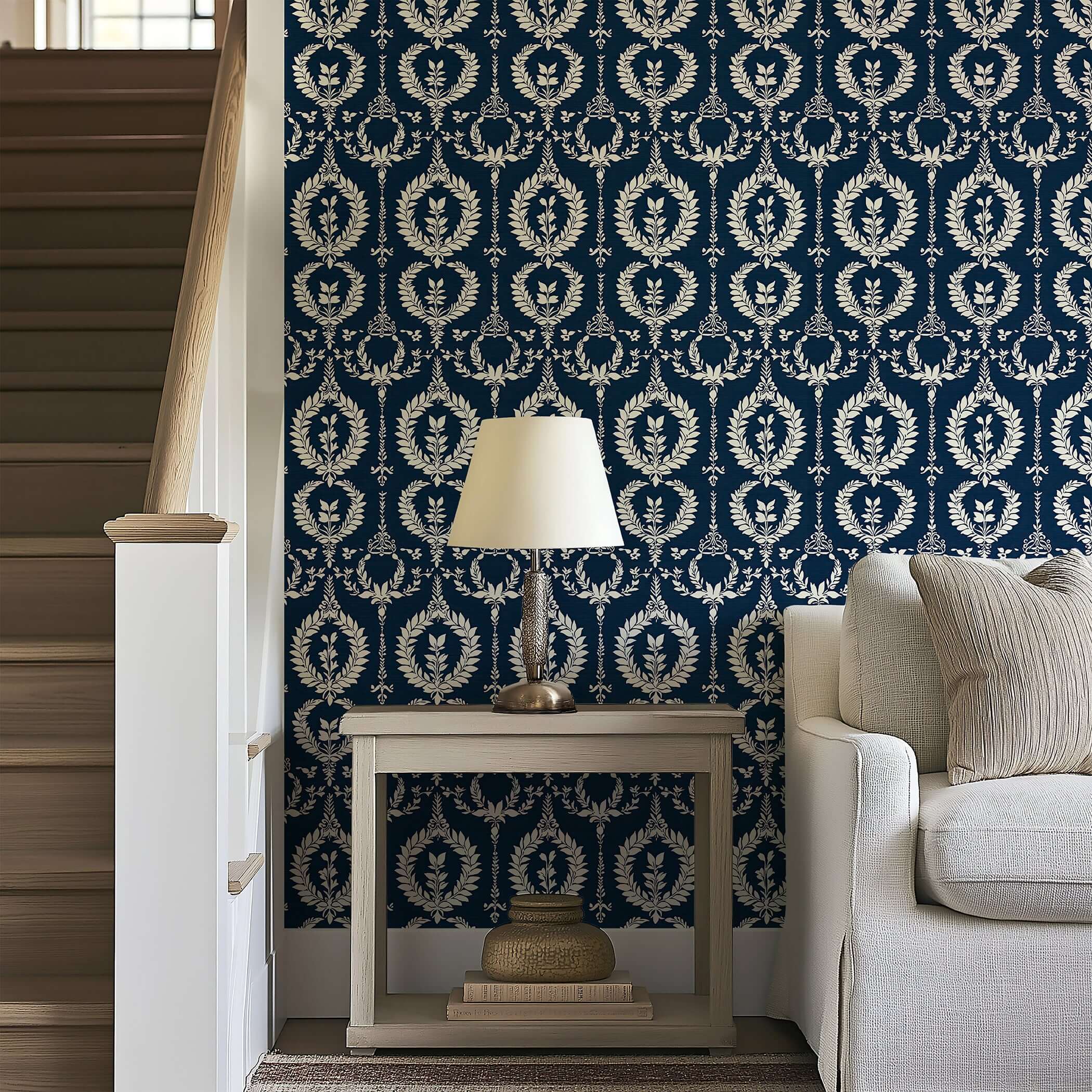 Nobility Wreath Wallpaper with ivory laurel wreaths on a navy background, enhancing traditional décor with florals and elegance.