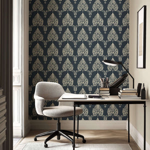 Elegant office with Noir Bloom wallpaper featuring creamy floral laurel wreaths on charcoal, enhancing sophistication and style.