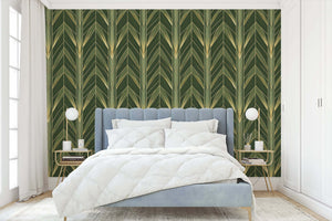 Luxurious bedroom with art deco wallpaper featuring green botanical and gold geometric design, enhancing elegant decor.