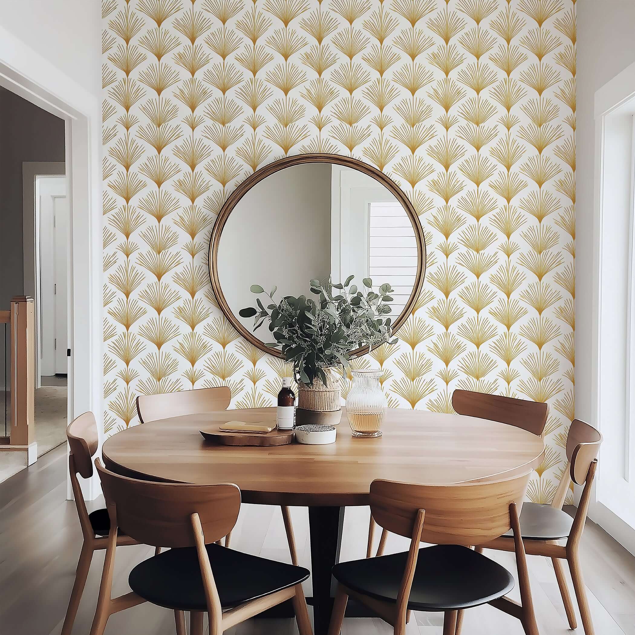 Dining room with Art Deco inspired "Golden Deco Fan" wallpaper featuring gold fan patterns on a white background and wooden furniture.