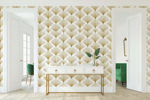 Art Deco wallpaper with gold fan patterns on white background in elegant living space, enhancing glamour and sophistication.