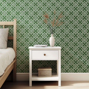 Modern geometric floral wallpaper in sage green with white patterns, perfect for accent walls and creative spaces.