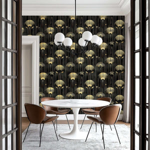 Modern dining room with Art Deco "Golden Luminaire" wallpaper featuring gold embellishments on a dark background.