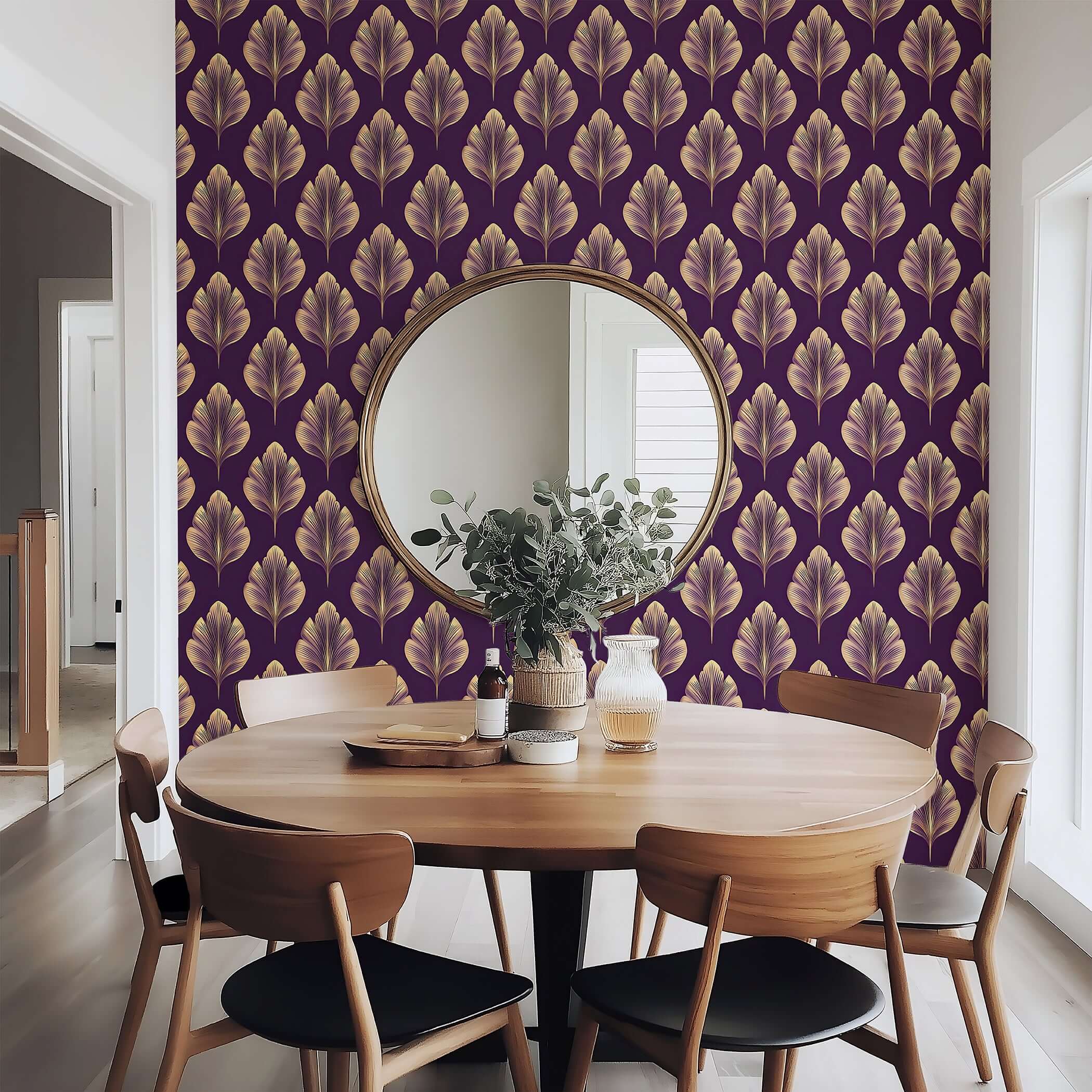 Golden Luxe Leaf Art Deco wallpaper with gold leaves on plum background enhances dining room, exemplifying modern floral design.