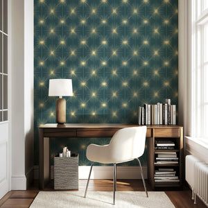 Mid-Century Modern Celestial Gold Sparkle wallpaper with starbursts on a teal-blue background, enhancing a retro-style room.