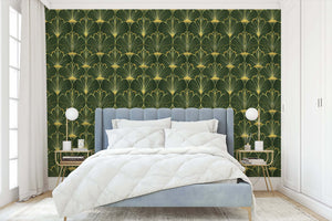 Luxurious bedroom with Gatsby's Garden Art Deco wallpaper featuring gold fan motifs on emerald green, epitomizing 1920s elegance.