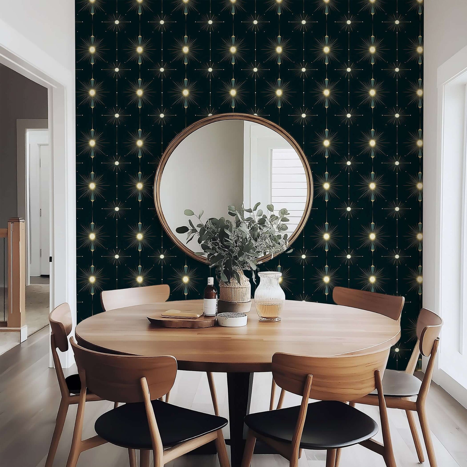 Art Deco Starlight Symphony wallpaper with starburst motifs, enhancing a dining room's elegance with gold tones against midnight shades.