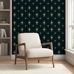 Art Deco Starlight Symphony wallpaper with starburst motifs in gold on deep midnight background, enhancing modern elegance in interiors.