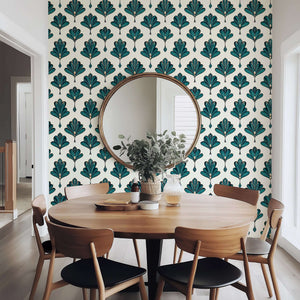 Art Deco wallpaper with emerald green fan-like pattern, enhancing a dining room with vintage elegance and sophistication.