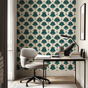 Art Deco wallpaper with emerald green fan-like leaf pattern in a modern office setting.