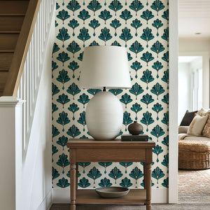 Art Deco wallpaper with emerald green fan leaf pattern in a modern hallway.