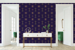 Art Deco Twilight wallpaper with dark colors and golden geometric patterns enhancing a modern interior space.