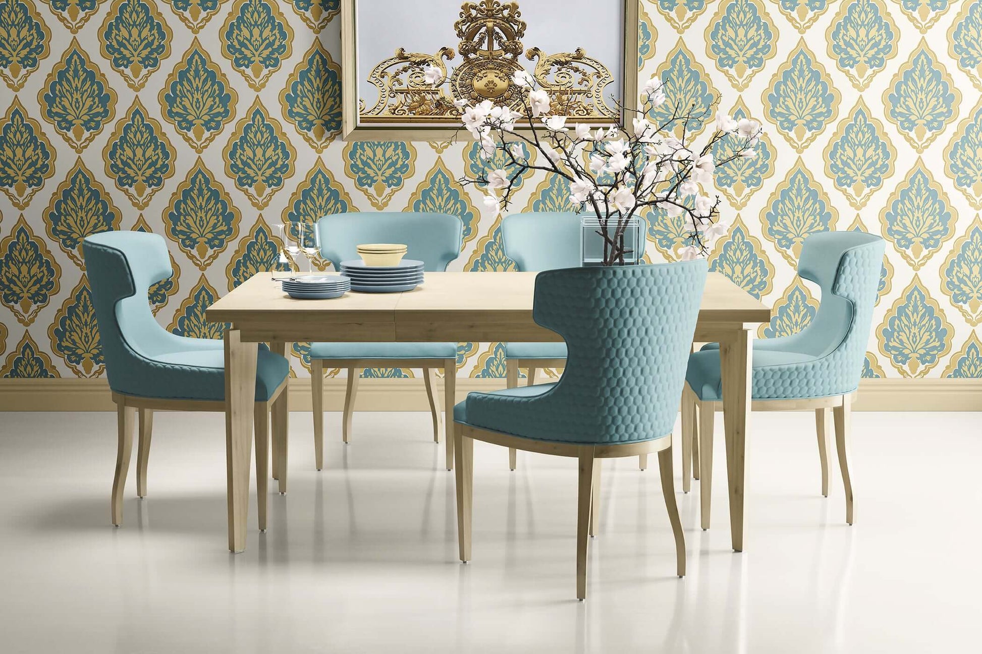 Dining room with teal and gold damask wallpaper, teal chairs, and wooden table showcasing vintage elegance.