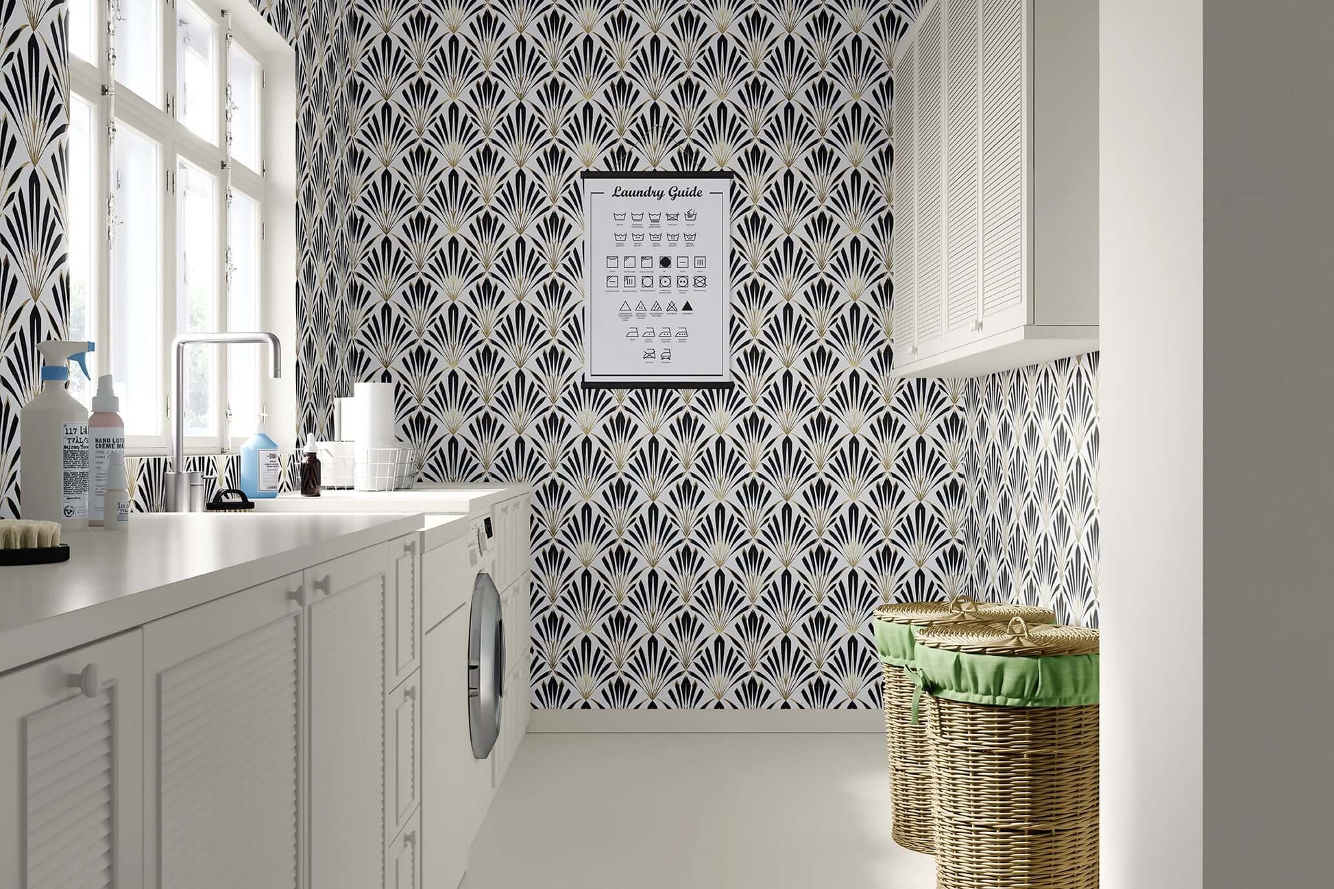 Black and white Art Deco wallpaper with geometric fan motifs in a chic laundry room, showcasing Deco Dynasty's sophisticated design.