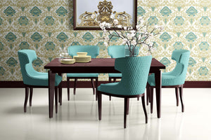 Elegant dining room with teal chairs and Golden Tapestry Revival wallpaper featuring damask patterns in teal, gold, and tan accents.