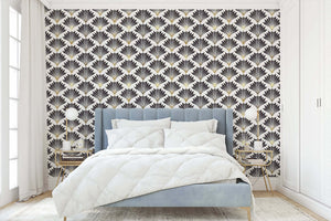 Art Deco wallpaper with black and gold fan motifs in bedroom setting, showcasing geometric and vintage design elegance.