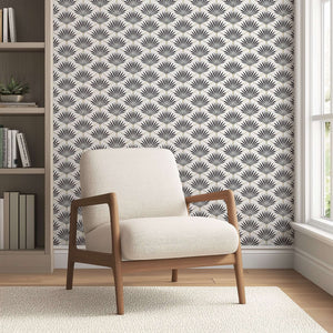 Art Deco wallpaper with black-and-white fan palms, featuring geometric elegance in a modern living room setting, perfect for statement walls.